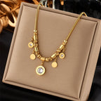 Zircon pendant necklace on jewelry bag: gold-tone chain with round charm drops
