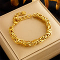 Gold-tone thick chain bangle bracelet with rectangular link segments and clasp