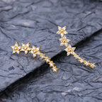 Gold daisy rhinestone ear climber earrings with white stones