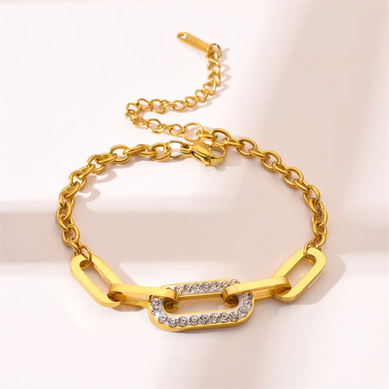 Gold thick chain geometric bracelet with oval pave bar detail and clasp