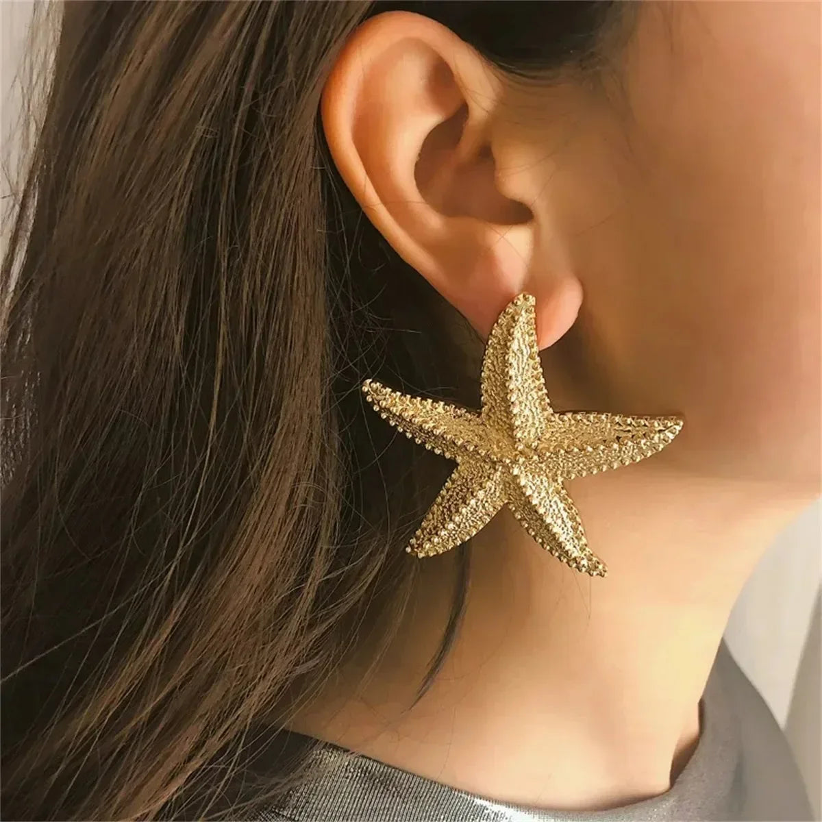 Boucles d'oreilles pendantes bohème à pompons — Étoile de mer et coquillage