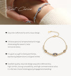 Sterling silver evil eye bracelet on wrist with blue oval center and pavé links