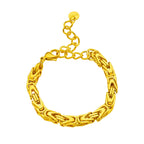 Gold-tone thick chain bangle bracelet with linked oval and bar segments