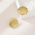 Boucles d'oreilles pendantes bohème à pompons — Étoile de mer et coquillage