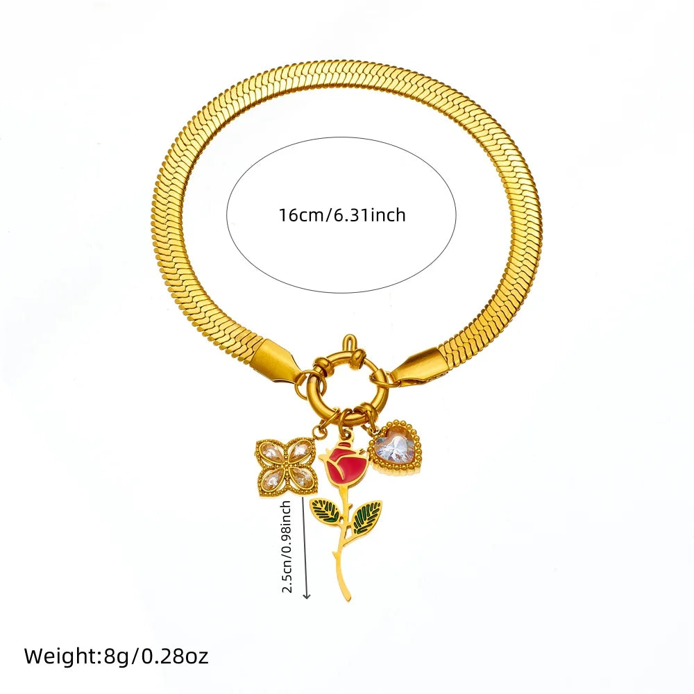 Gold-tone rose flower pendant necklace with red and blue enamel heart charms