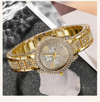 Gold-tone rhinestone watch with bracelet band and three subdials
