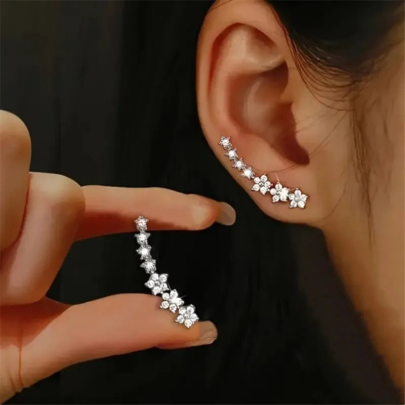 Daisy rhinestone ear climber earrings with silver daisy row