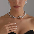 Silver-tone lava drip choker necklace and drop earrings