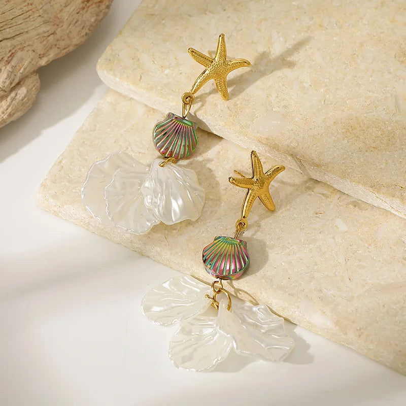 Gold starfish and rainbow striped shell bead earrings with white petal drop charms
