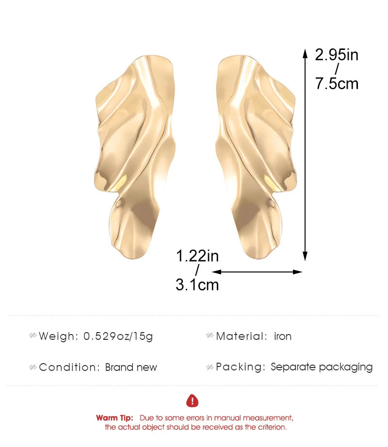 Gold-tone textured curved oval stud earrings with a wavy surface