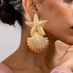 Gold starfish and shell statement earrings, textured dangling charms