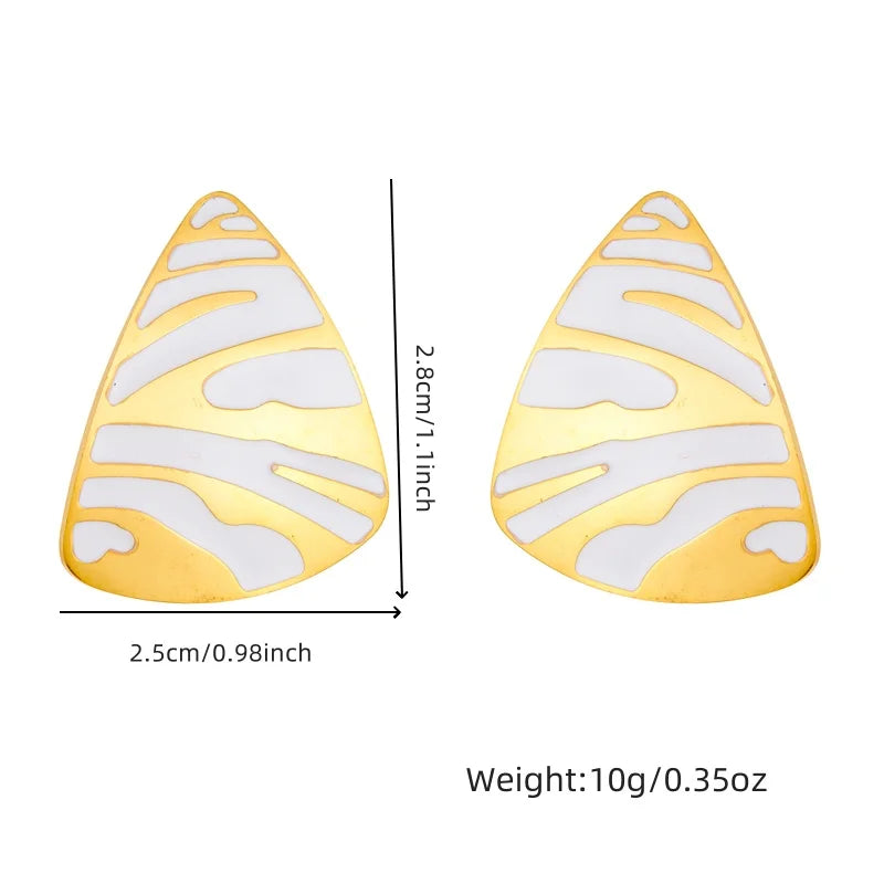 White tiger stripe teardrop earrings, gold-tone with cutout pattern, pair