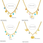 Gold-tone multi-pendant necklace on white background with blue, heart, and flower charms
