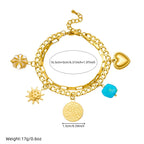 Gold-tone double-layer chain bracelet with sun, heart, coin charms and turquoise bead