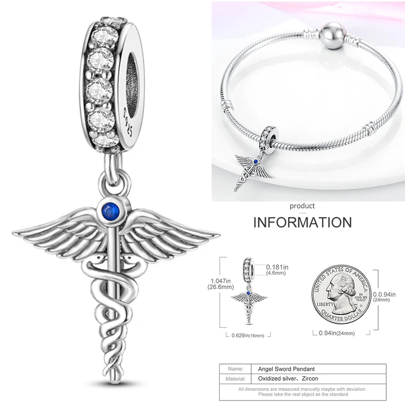 Sterling silver angel-sword charm bead with blue center stone and crystal ring