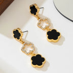 Five-petal flower long drop earrings, gold-tone with black enamel clover and clear crystal halos