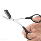 Eyebrow scissors with comb, black handle and metal blades with comb teeth