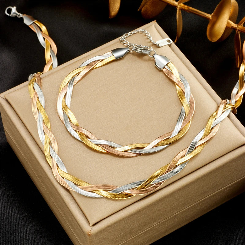 Two-tone snake-chain necklace and bracelet set, gold and silver twisted links with clasp