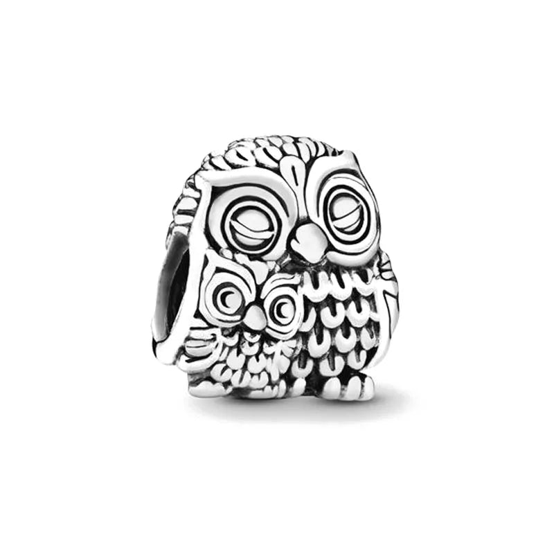 Sterling silver sculpted animal charm bead with engraved circular pattern