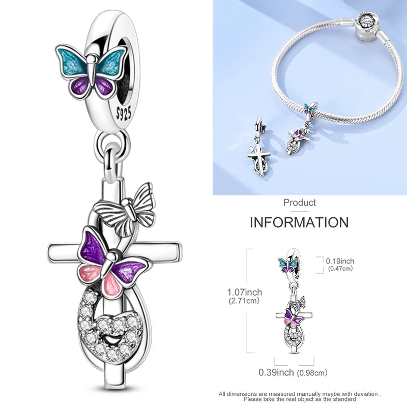 Sterling silver cross charm with butterfly and heart motifs in enamel accents