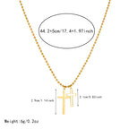 Gold cross pendant necklace with two cross charms on a ball-bead chain