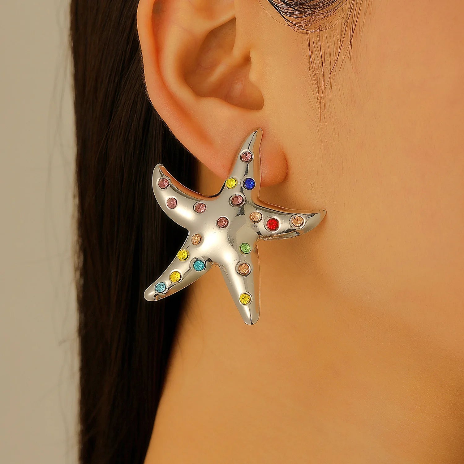 Silver starfish stud earrings with multicolor rhinestones