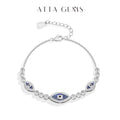 Evil eye bracelet in sterling silver with blue enamel oval and round bead links