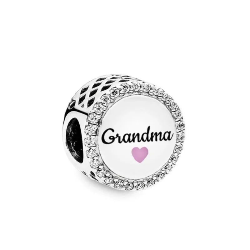 Silver circular charm bead with “Grandma” engraving and purple heart in center