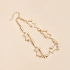 Gold-tone lava drip choker necklace, chain link design