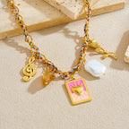 Rainbow-link charm necklace with pink heart pendant, white baroque pearl, and gold accents