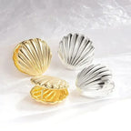 Boucles d'oreilles pendantes bohème à pompons — Étoile de mer et coquillage