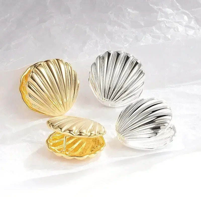 Boucles d'oreilles pendantes bohème à pompons — Étoile de mer et coquillage