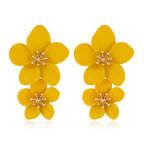 Yellow double-layer flower dangle earrings with gold-tone star centers