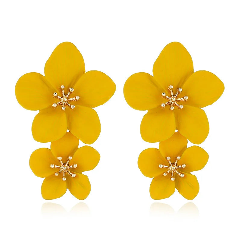 Yellow double-layer flower dangle earrings with gold-tone star centers