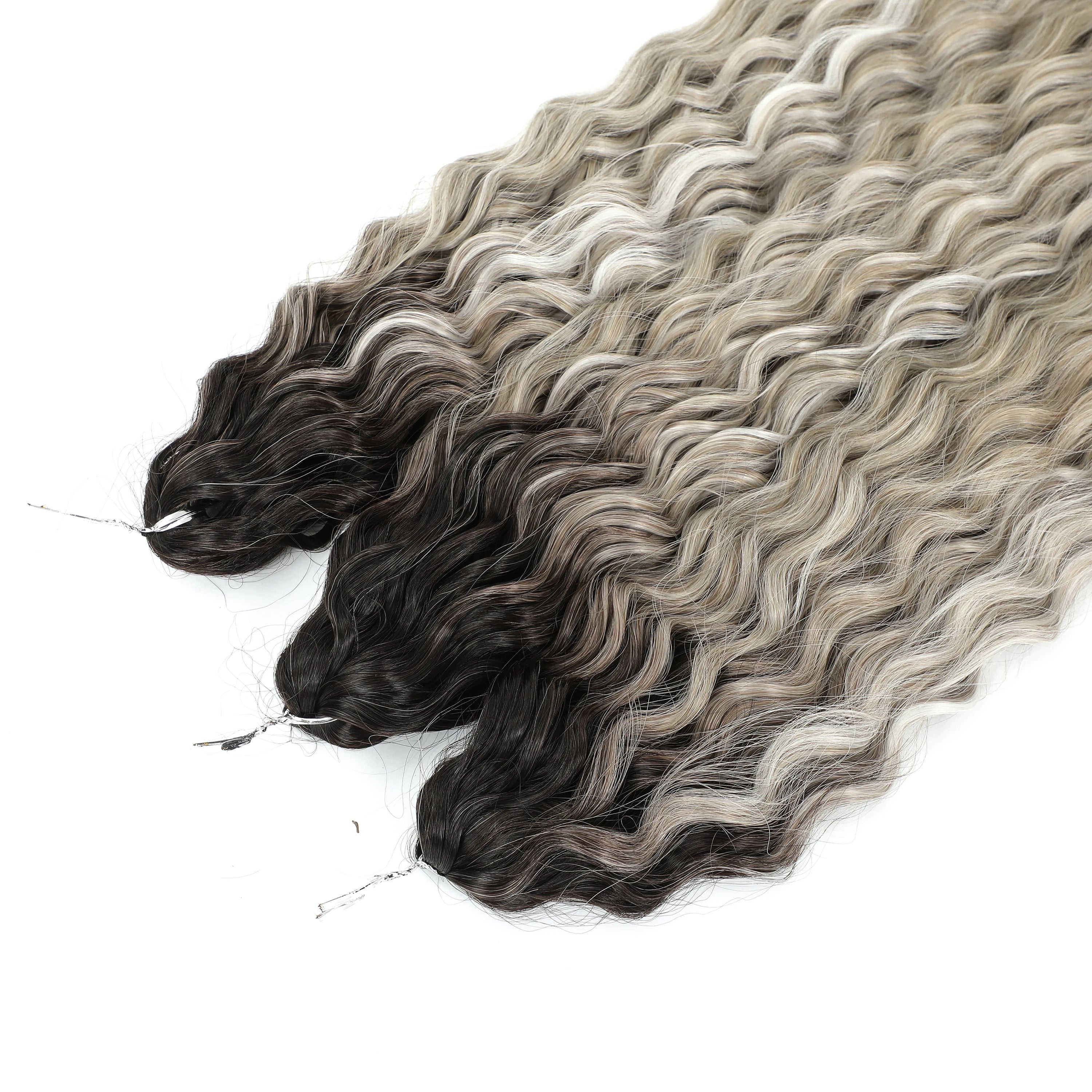 Water-wave hair extension close-up, dark roots fading to light gray