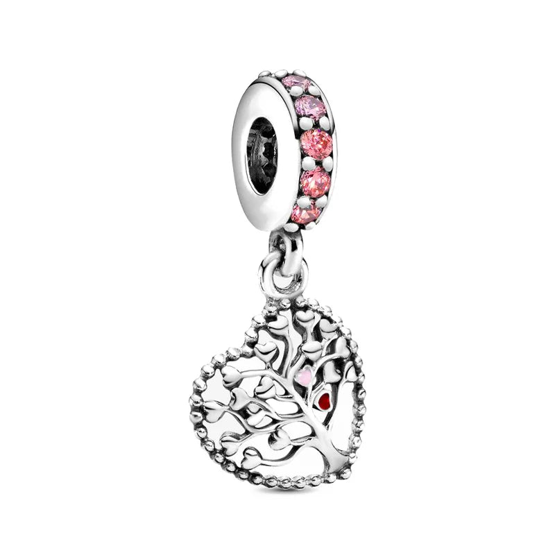 Sterling silver tree-of-life charm bead with pink gemstone accents