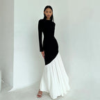 Side-view round-neck long-sleeve dress, black fitted bodice and white flared hem