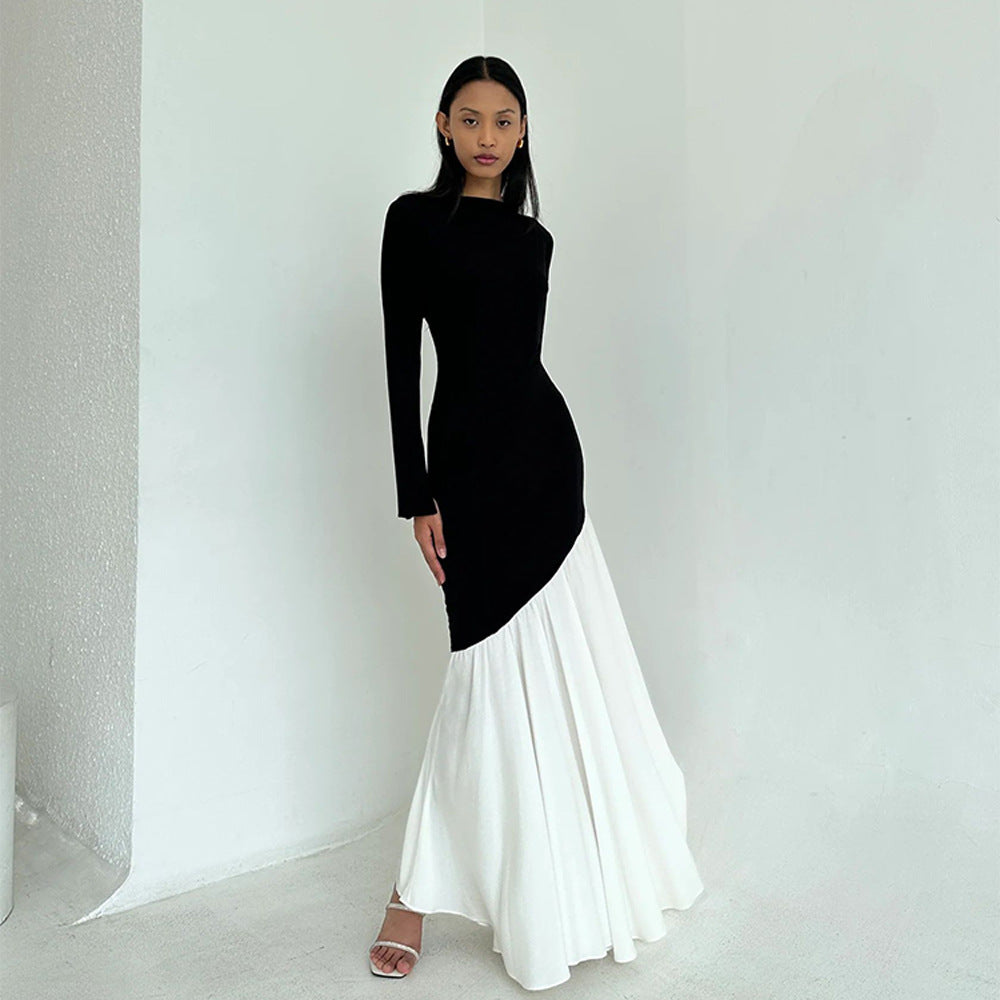 Side-view round-neck long-sleeve dress, black fitted bodice and white flared hem