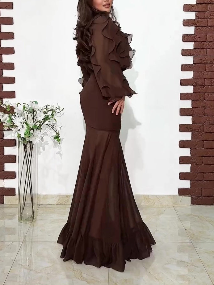 Ruffled dark brown blouse and sheer mermaid maxi skirt set, angled side view