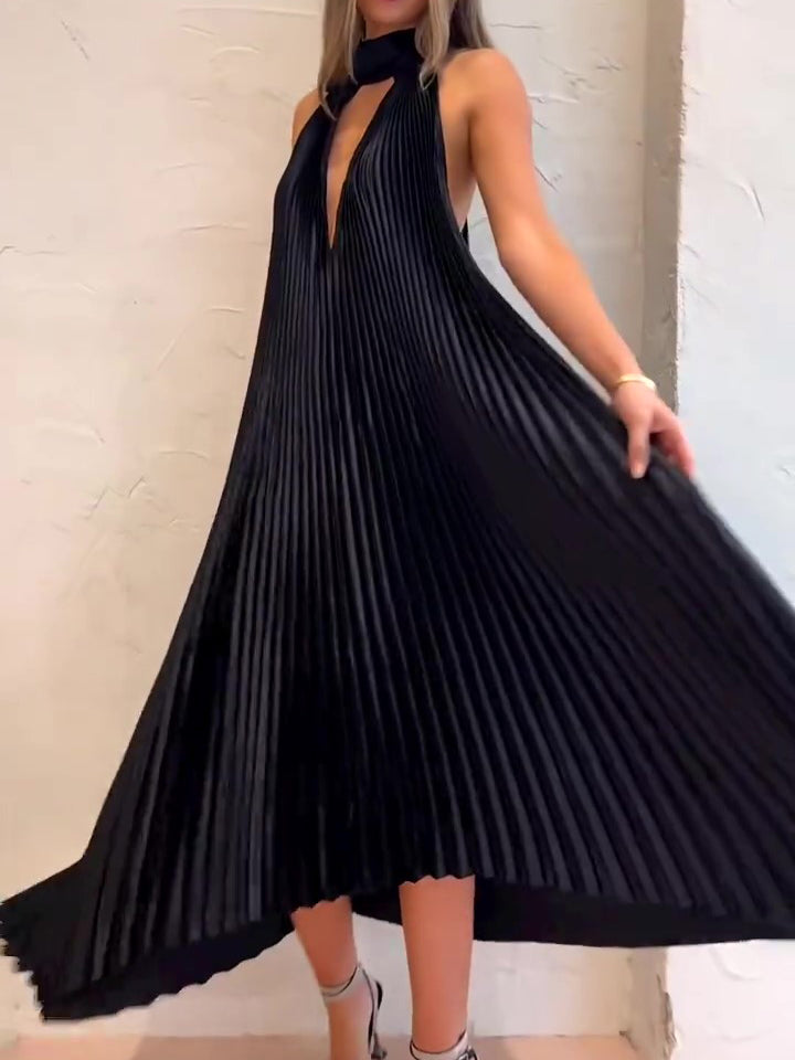 Black pleated halter maxi dress with flowing A-line skirt