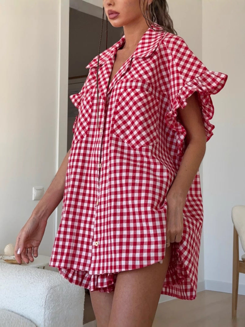Red gingham ruffled shirt with high-waisted shorts, draped shoulder ruffles